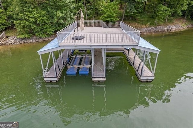 view of dock featuring a water view and boat lift