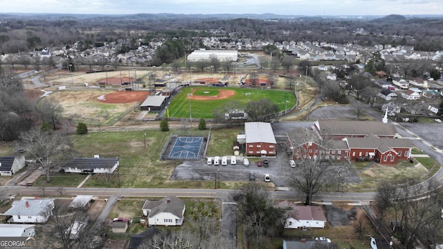 birds eye view of property with a residential view