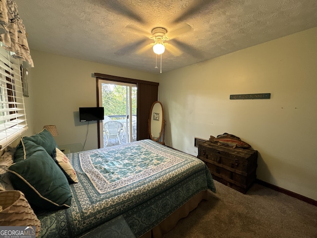 bedroom featuring baseboards, carpet, ceiling fan, and a textured ceiling