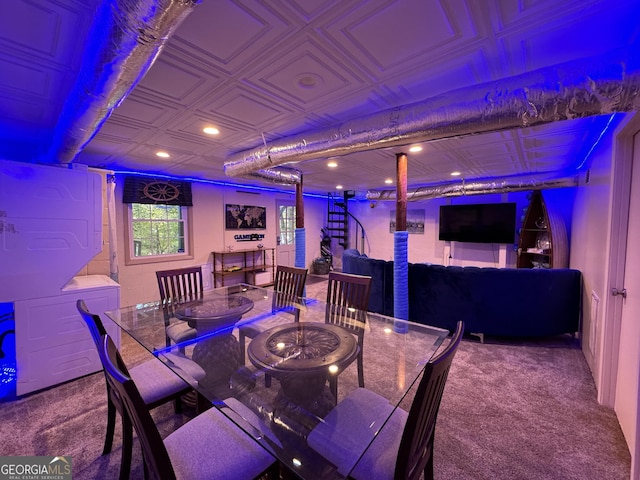 carpeted dining space featuring recessed lighting, an ornate ceiling, and stairs