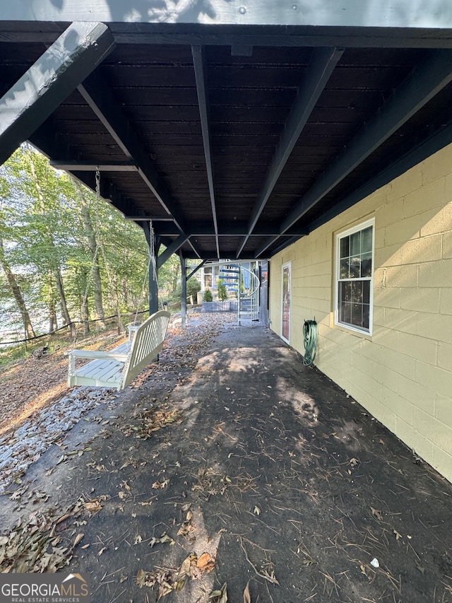 exterior space featuring a carport