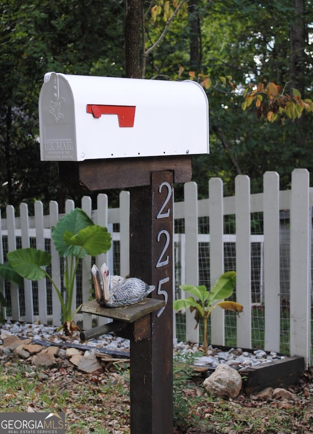 exterior details featuring fence