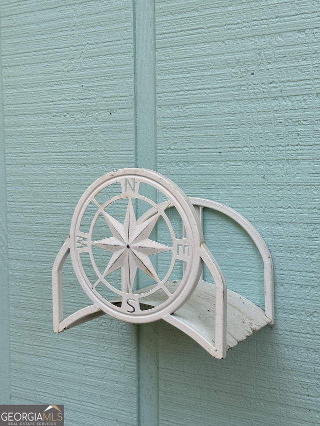 exterior details featuring brick siding