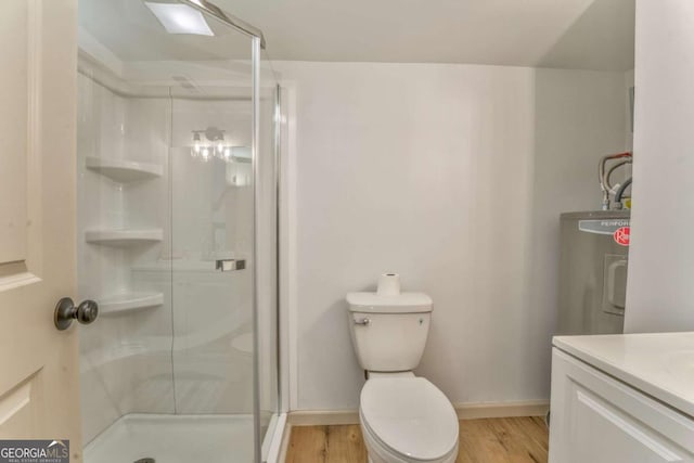 bathroom featuring a shower stall, electric water heater, and wood finished floors