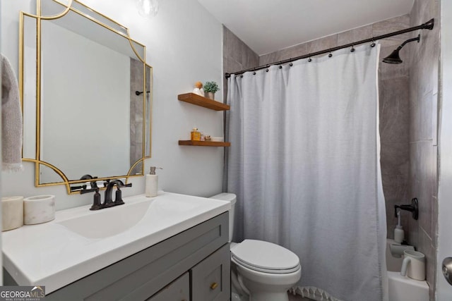 full bathroom featuring toilet, vanity, and shower / bath combo