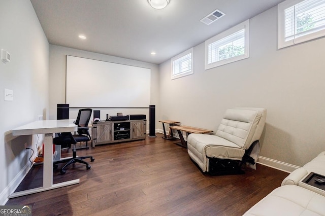 office featuring visible vents, recessed lighting, baseboards, and wood finished floors