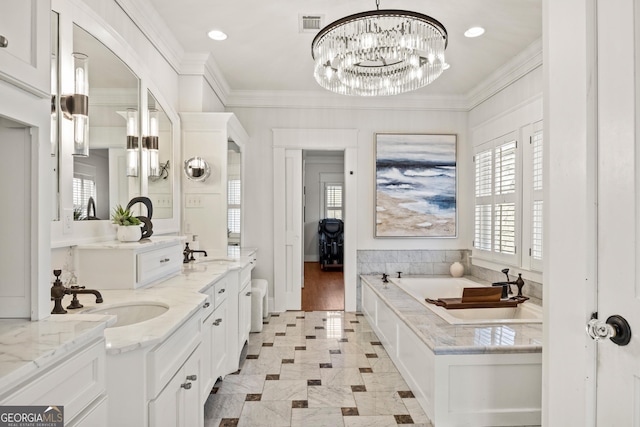 full bathroom featuring a wealth of natural light, an inviting chandelier, and ornamental molding