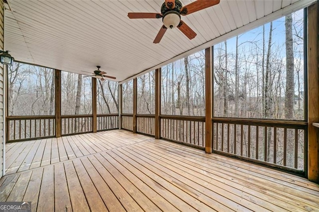 unfurnished sunroom featuring a healthy amount of sunlight