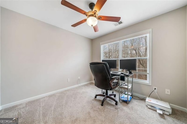 home office with visible vents, ceiling fan, baseboards, and carpet floors