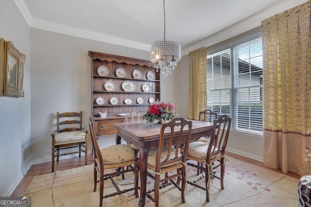 living room featuring crown molding, wood finished floors, and french doors
