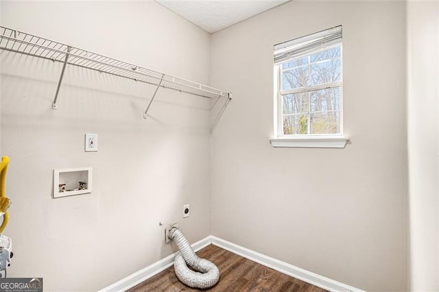 laundry area with wood finished floors, baseboards, laundry area, electric dryer hookup, and washer hookup