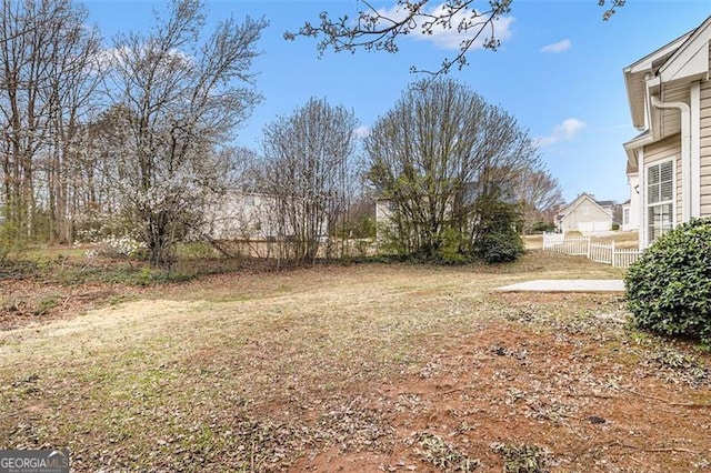 view of yard with fence