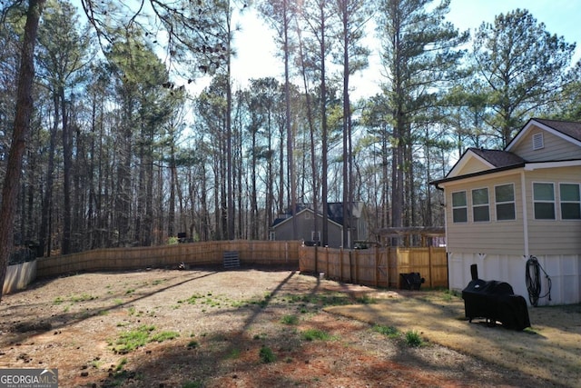 view of yard with fence