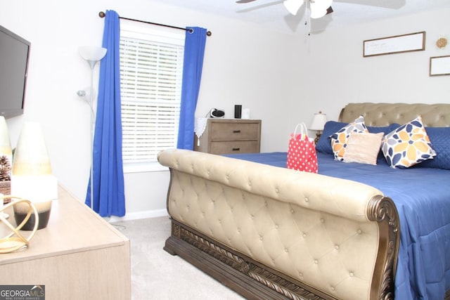 bedroom featuring carpet flooring, baseboards, and ceiling fan