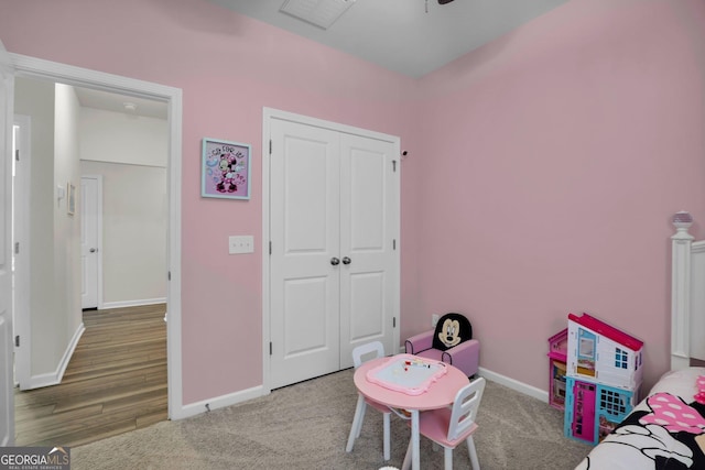 playroom with visible vents, baseboards, and carpet flooring