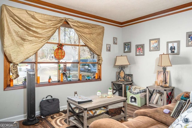 home office with wood finished floors, baseboards, and ornamental molding