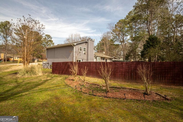 view of yard featuring fence