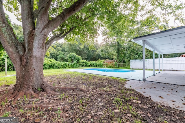 view of pool with a fenced in pool, a patio, and fence