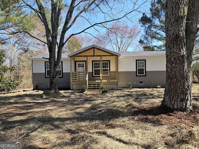 view of front of house featuring crawl space and a porch