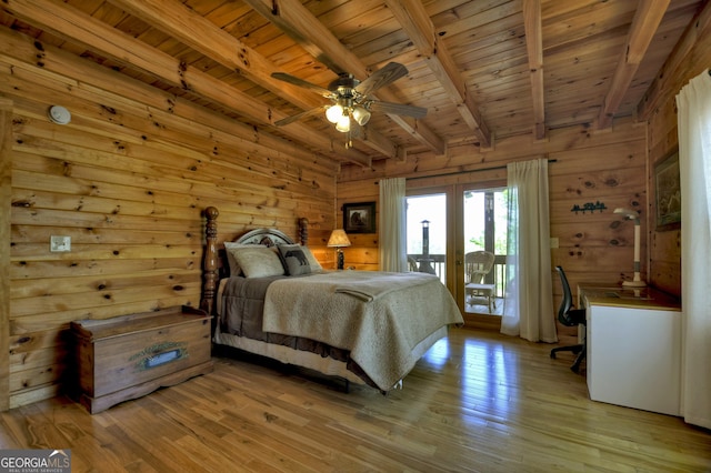bedroom featuring wooden walls, access to exterior, wooden ceiling, and beam ceiling