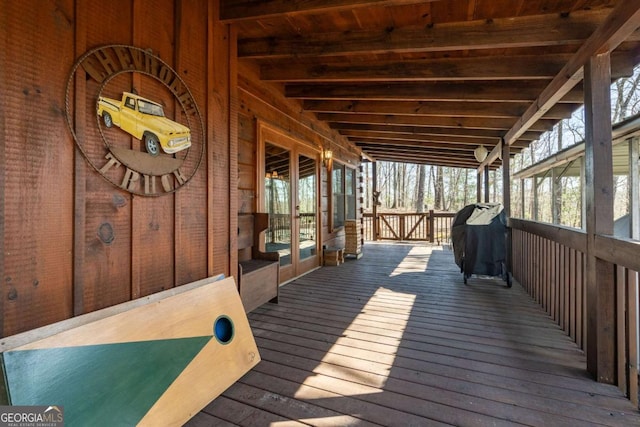 deck with french doors and grilling area