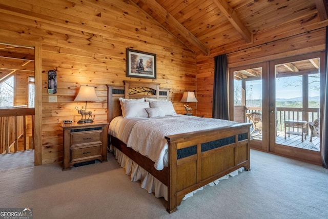 bedroom featuring wood walls, lofted ceiling with beams, light carpet, wooden ceiling, and access to outside