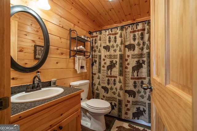 full bathroom with a shower with curtain, toilet, wood walls, wood ceiling, and vanity