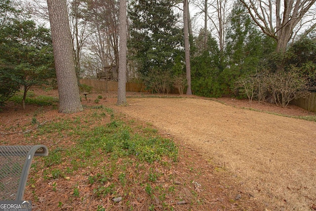 view of yard with fence