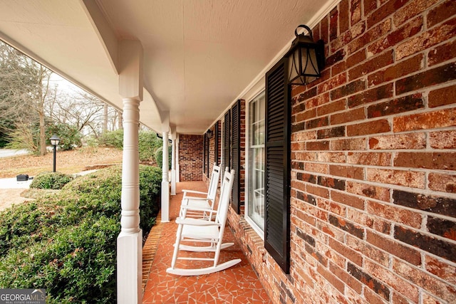 view of patio featuring covered porch