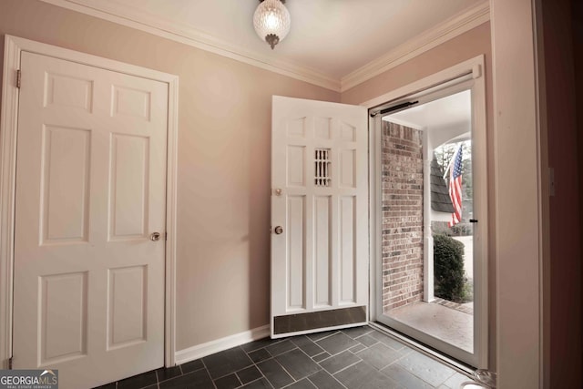 doorway featuring baseboards and crown molding