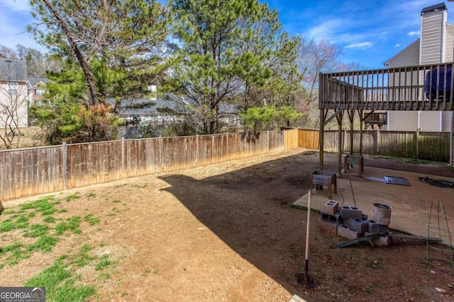 view of yard featuring a fenced backyard