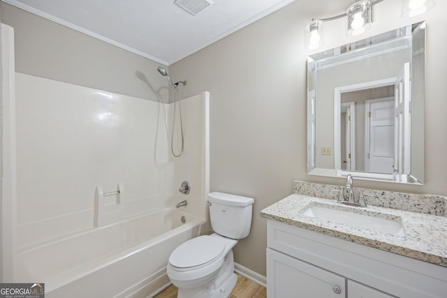 full bath with visible vents, toilet, shower / tub combination, wood finished floors, and vanity