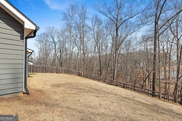 view of yard featuring fence