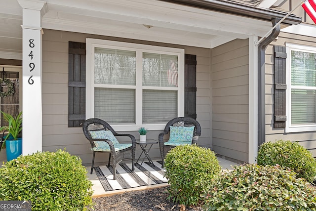 property entrance with covered porch