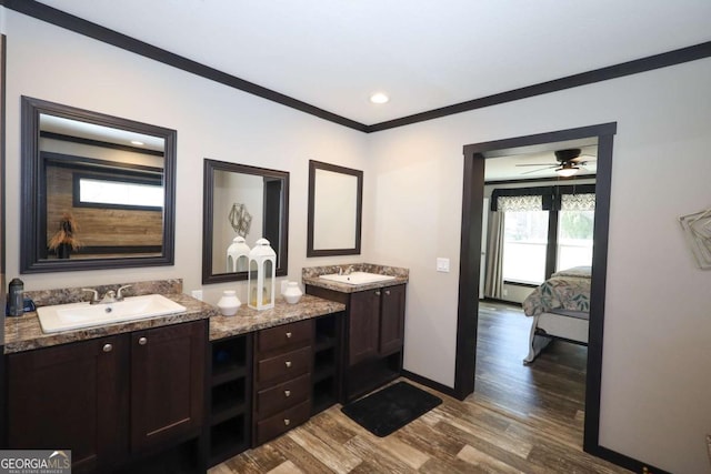 2802 County Road 19, Woodland, AL 36280 - full bath with ensuite bathroom, double vanity, wood finished floors, ornamental molding, and ceiling fan