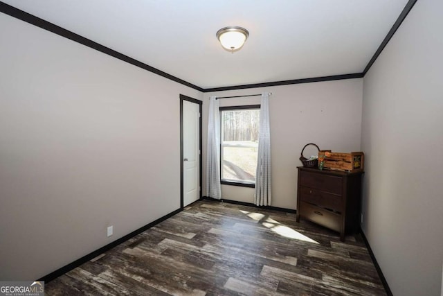 2802 County Road 19, Woodland, AL 36280 - unfurnished bedroom with ornamental molding, wood finished floors, and baseboards