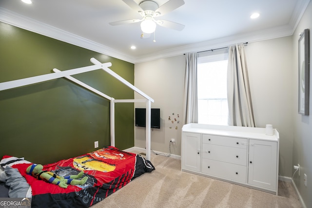 bedroom featuring light carpet, ceiling fan, crown molding, and baseboards