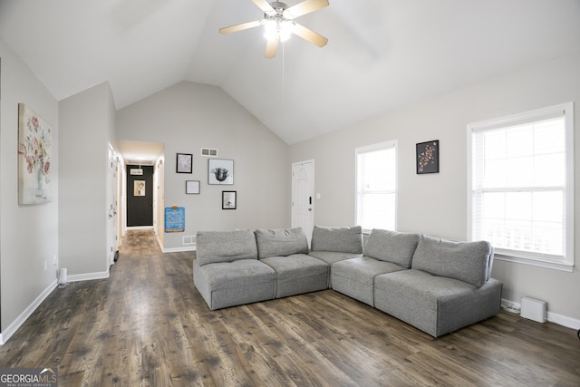 living room with ceiling fan, visible vents, a healthy amount of sunlight, and dark wood finished floors