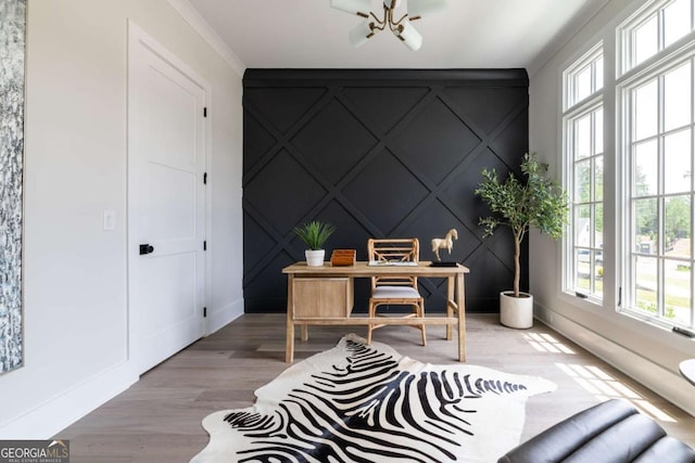 64 Telfair Ct, Acworth, GA 30101 - home office featuring baseboards, wood finished floors, an accent wall, and a decorative wall