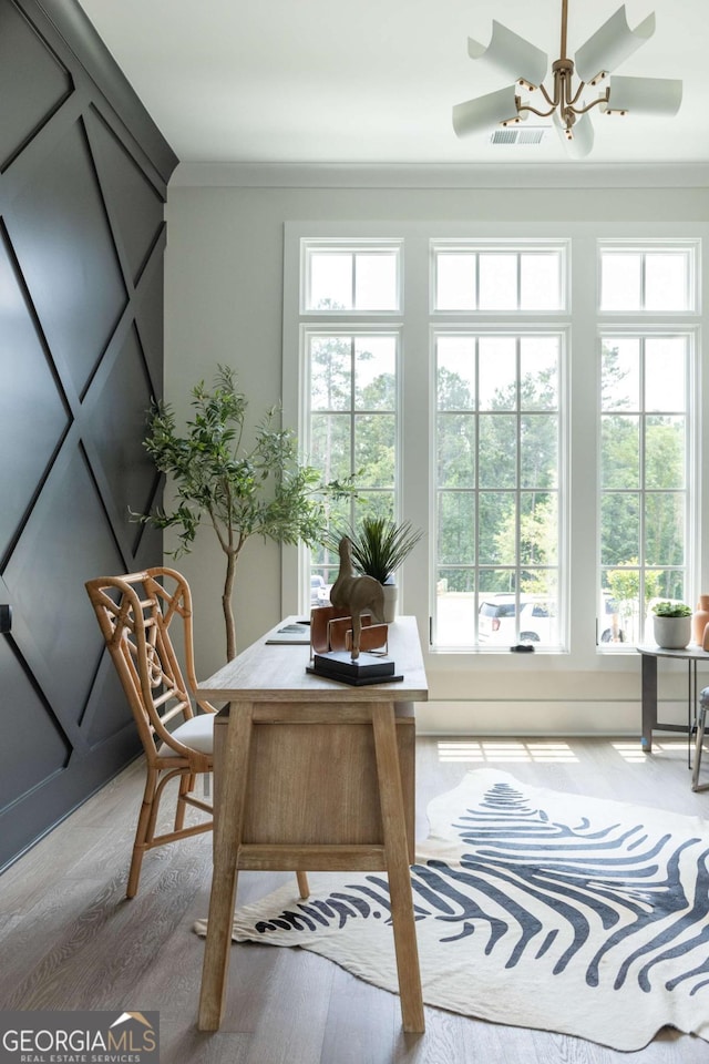 64 Telfair Ct, Acworth, GA 30101 - interior space with wood finished floors, a healthy amount of sunlight, ornamental molding, and visible vents