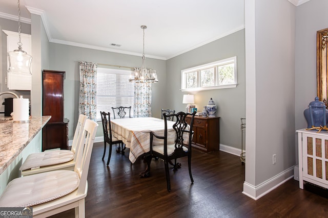 dining area with visible vents, ornamental molding, baseboards, and dark wood-style flooring