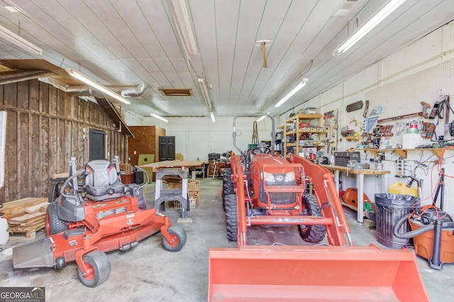 garage with a workshop area