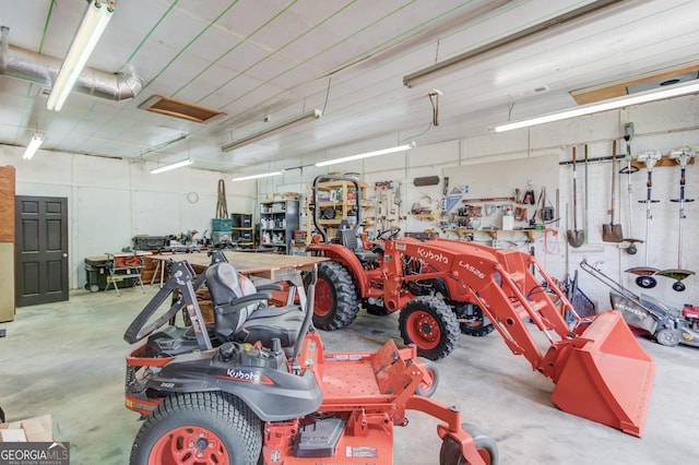 garage with a workshop area