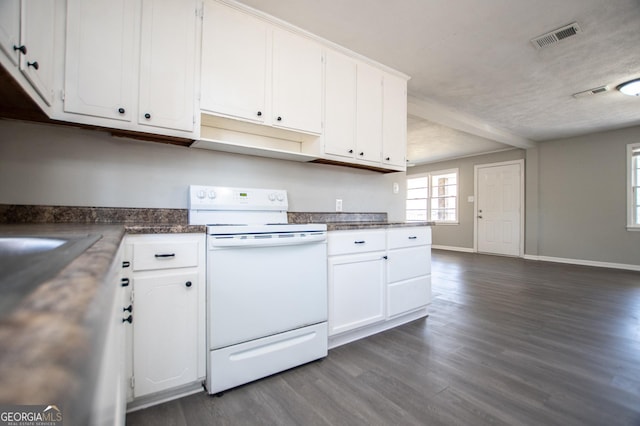 kitchen featuring white cabinets and white electric range oven