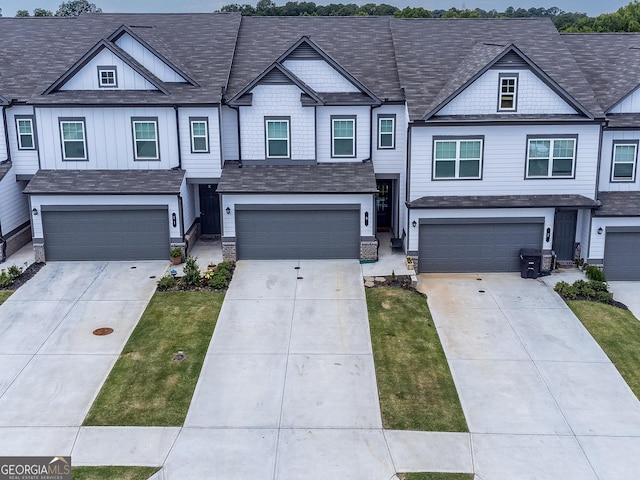 view of front of property with a garage and driveway