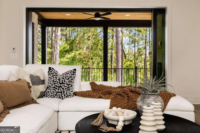 interior space featuring plenty of natural light and a ceiling fan