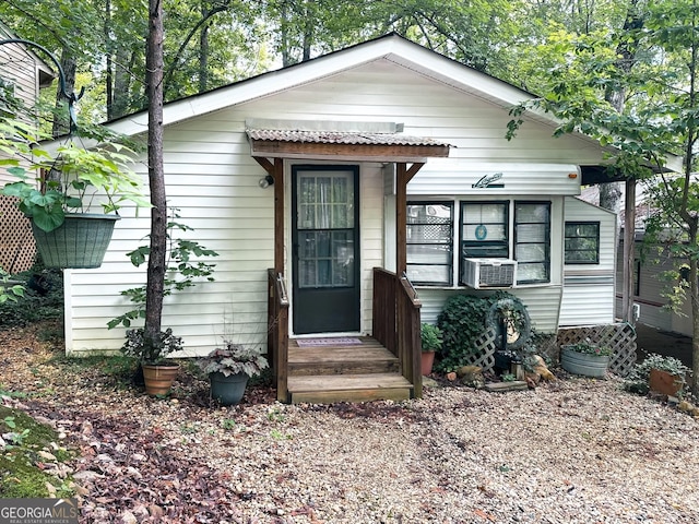 view of front facade featuring cooling unit