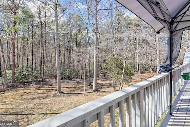 exterior space with a forest view