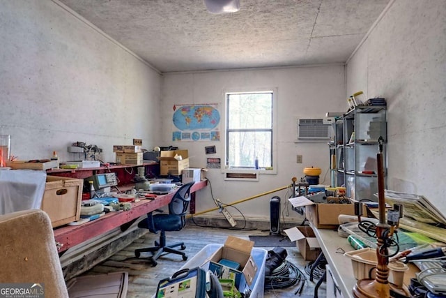 office featuring wood finished floors and a wall mounted AC