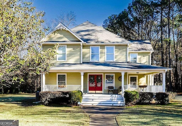 view of front of home featuring a porch and a front yard